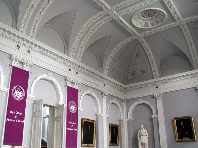 In 1859, the Royal College of Physicians of Ireland purchased the former premises of the Kildare Street Club, but unfortunately the property burned down prior to the college taking occupancy, resulting in their commissioning William Murray to design their new building on the site.