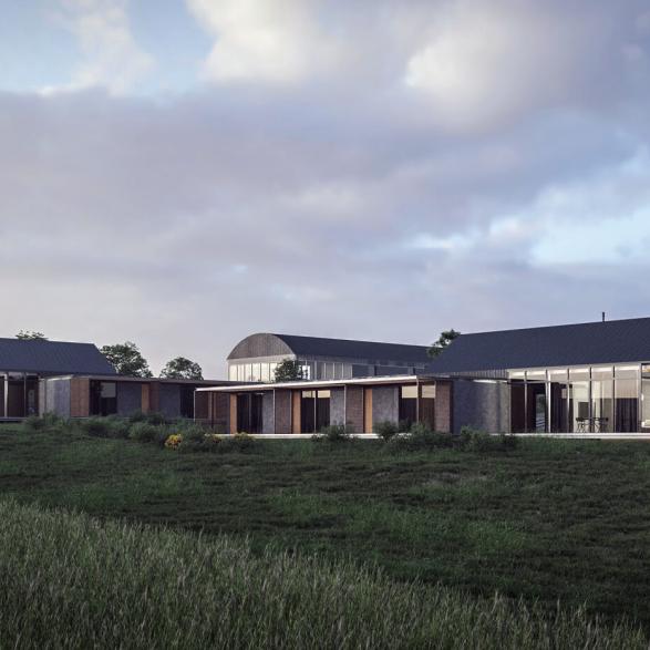 Luxury holiday homes on a historic farmstead at Old Head Golf Links, County Cork, with serviced cottages enclosing a communal courtyard.